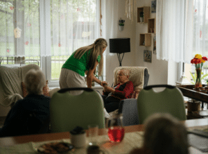 how many caregivers per resident in memory care